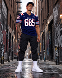 Polynesian athlete wearing the navy Samoa 685 jersey with proportional chest monogram